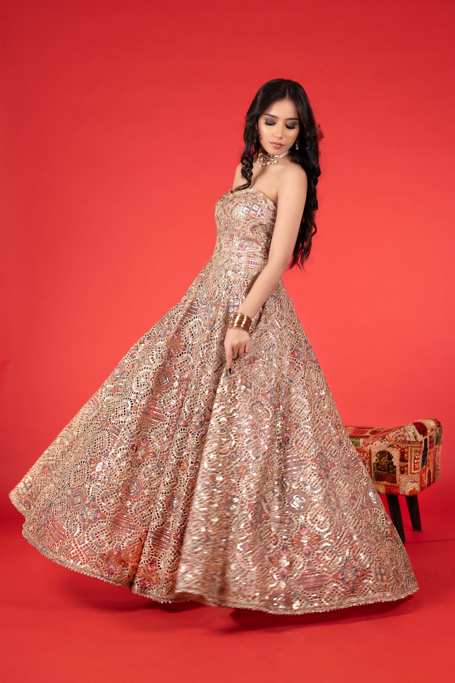 Stunning shoulder less heavy embroidered gown