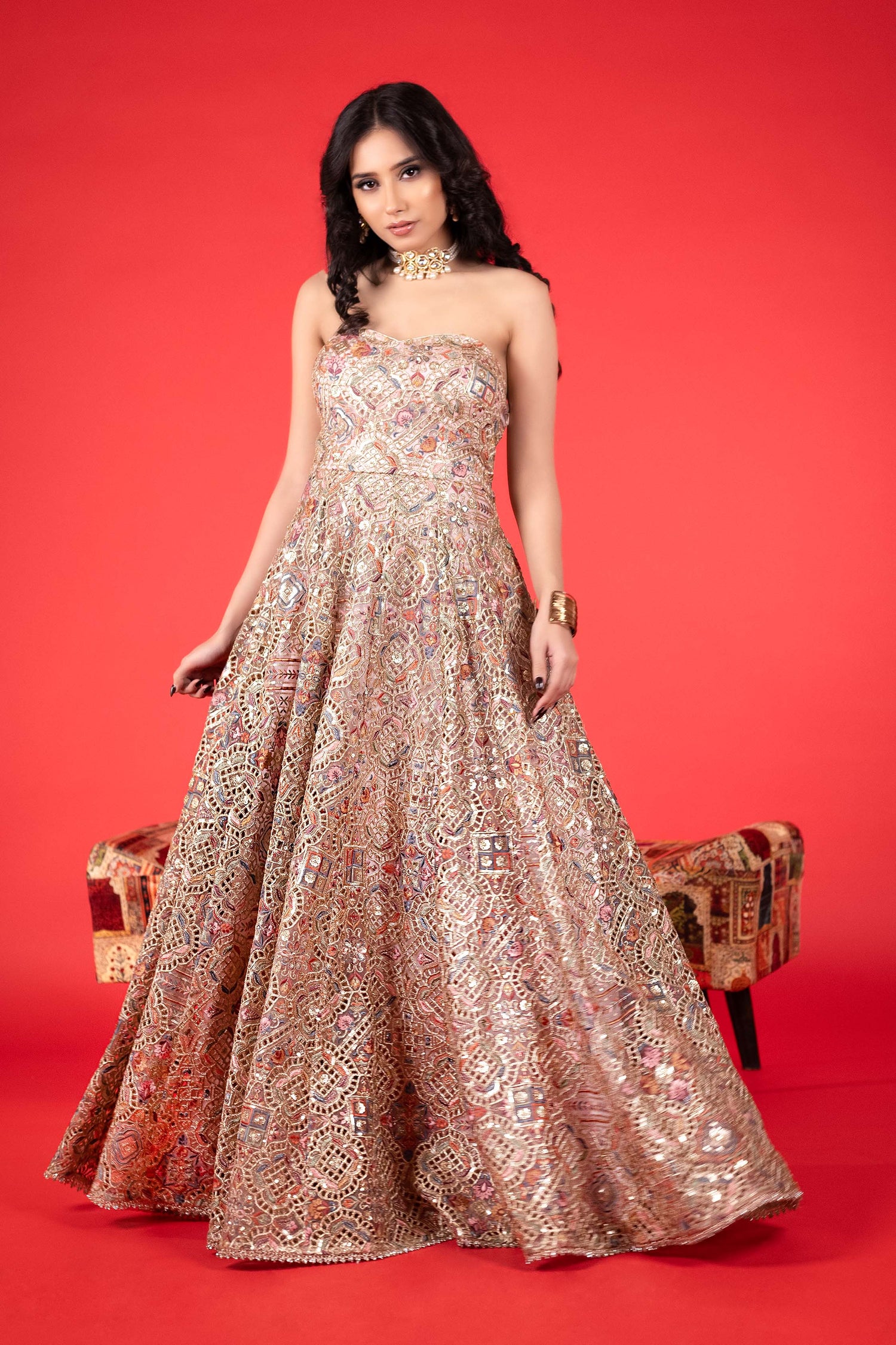 Stunning shoulder less heavy embroidered gown