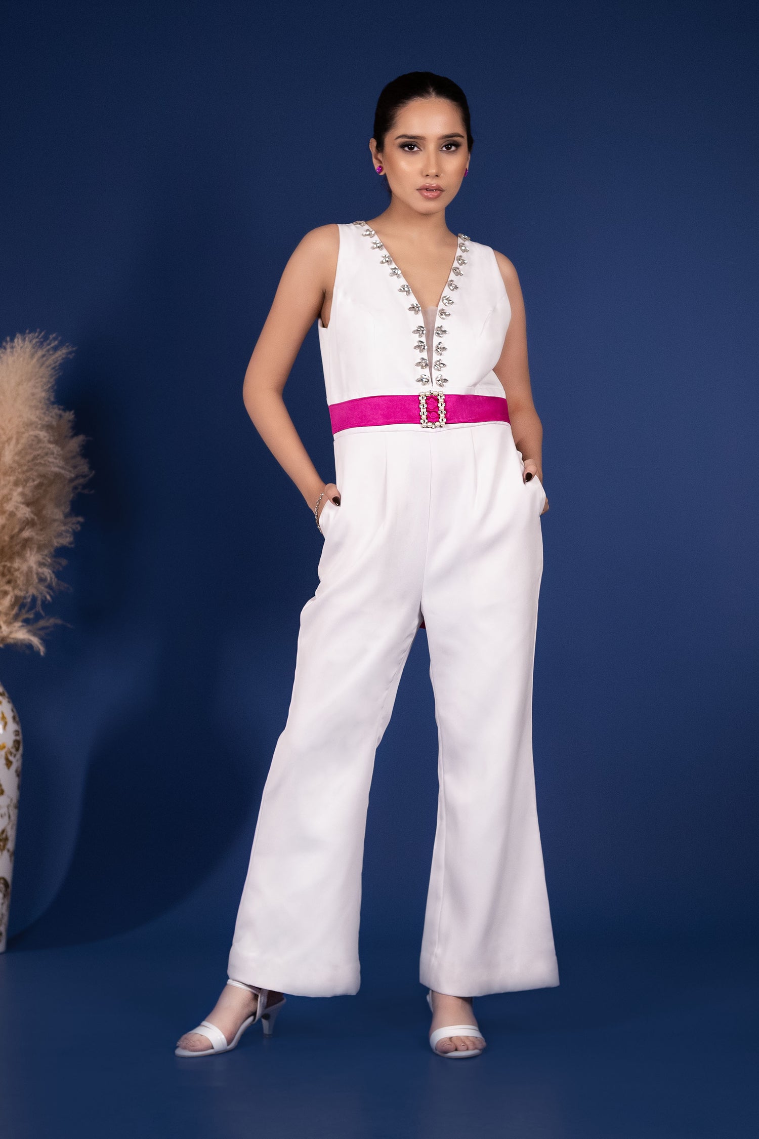 White Jumpsuit with Extravagant Magenta Bow