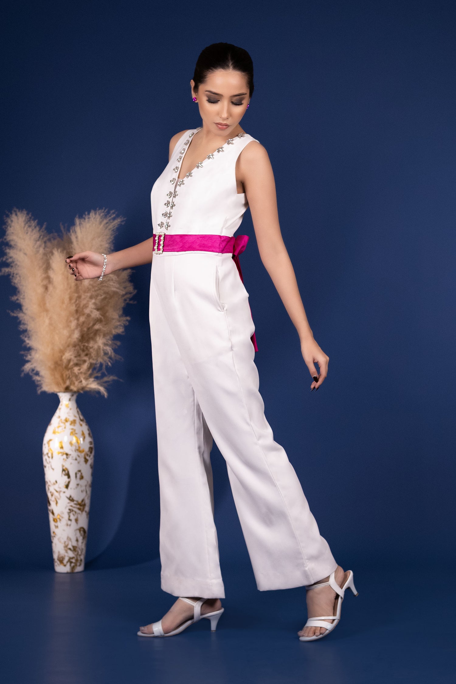 White Jumpsuit with Extravagant Magenta Bow